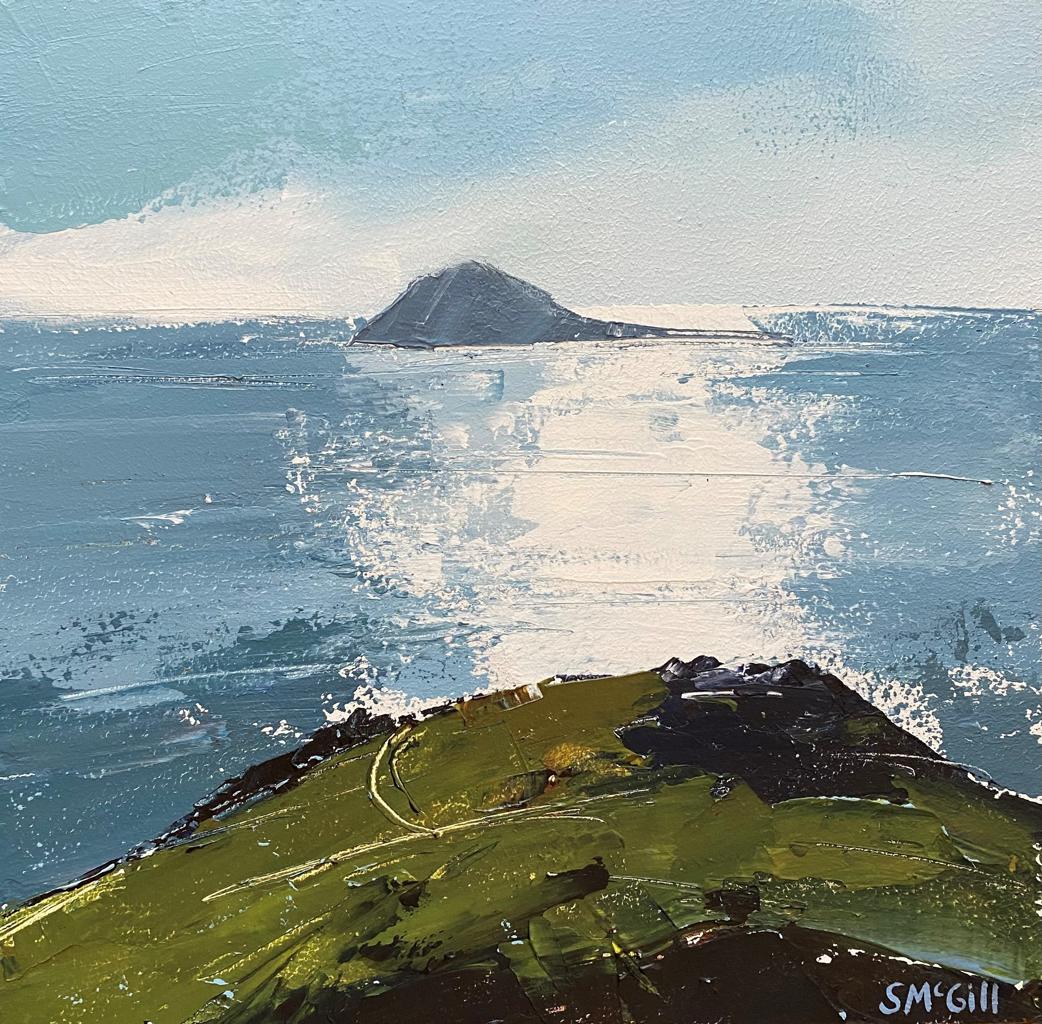 painting standing on a mountain looking out on the beautiful sea with the sun reflecting