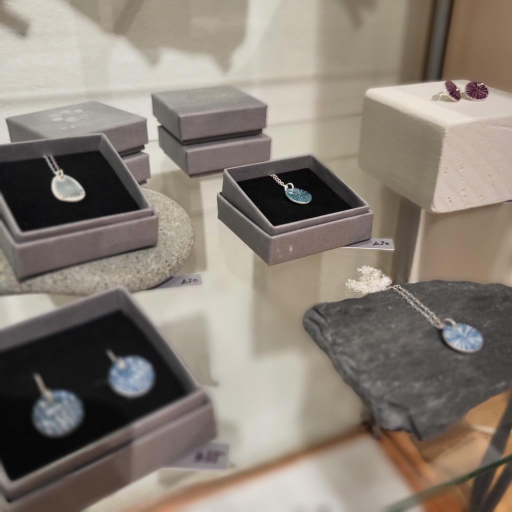 three blue necklaces 