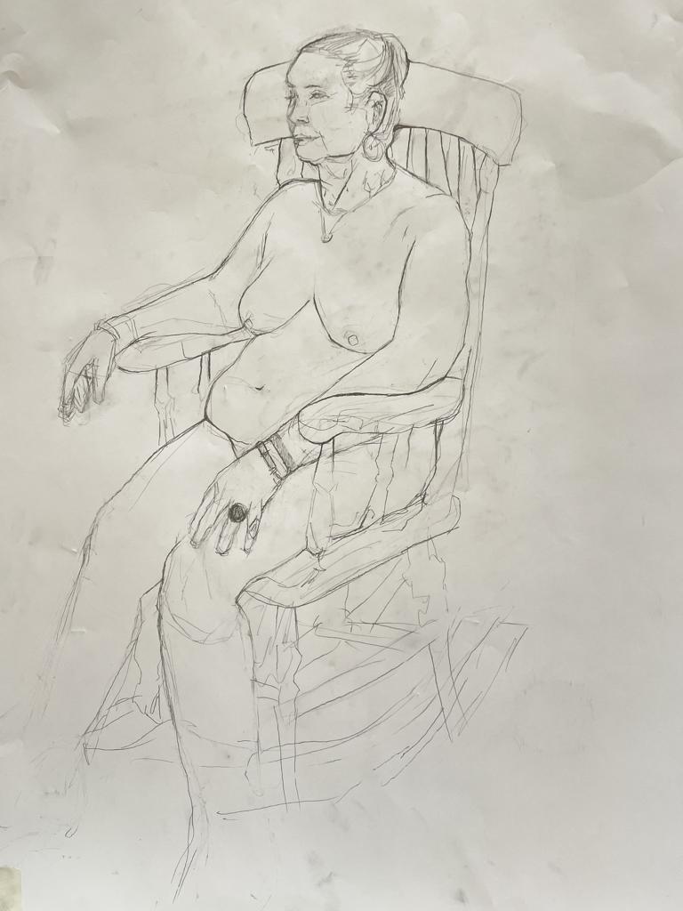 A pencil life drawing of a woman sitting in a rocking chair