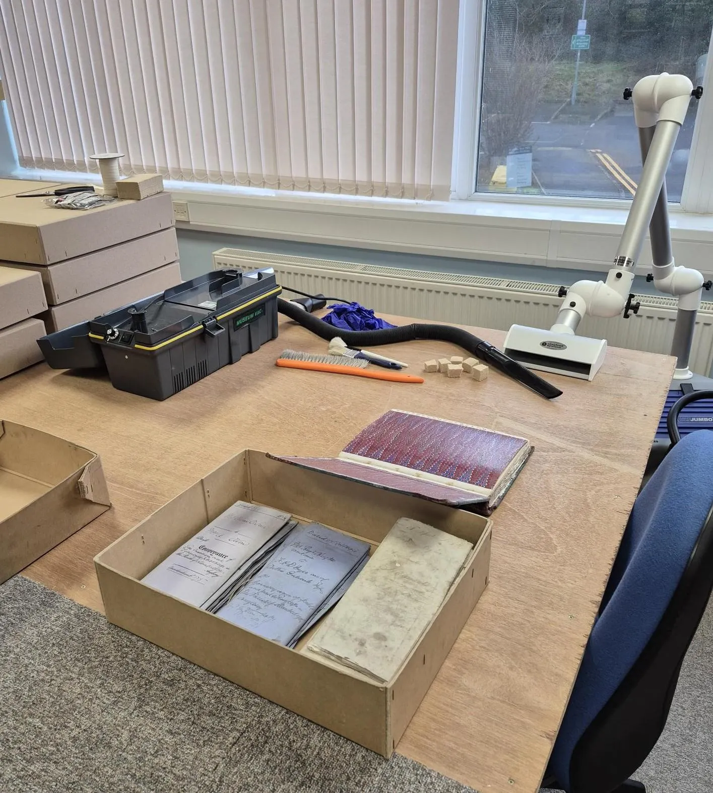 A photograph of the findings being sorted through at Anglesey Archives