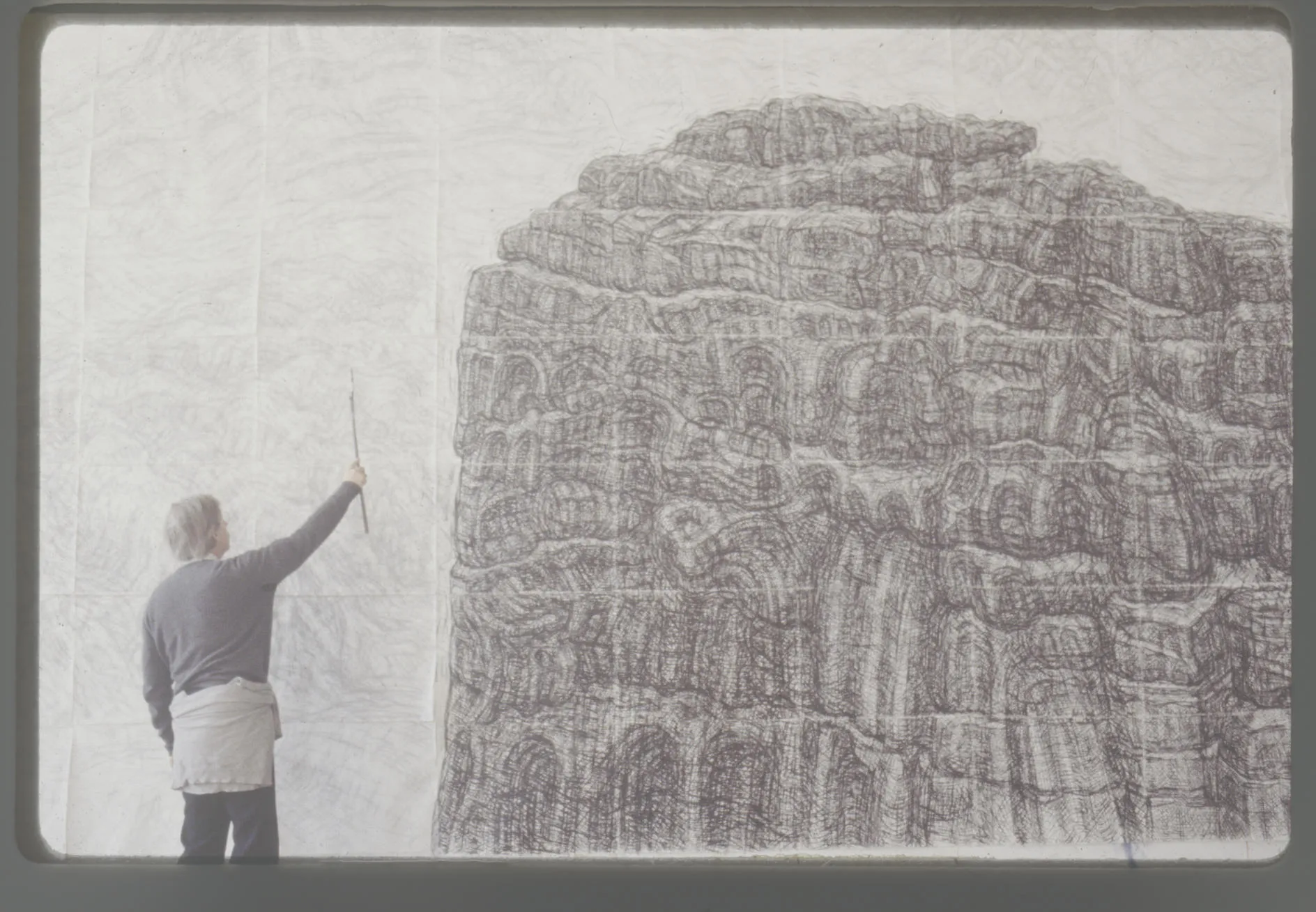 Leonard measuring the drawing Rock and Sea Anglesey.