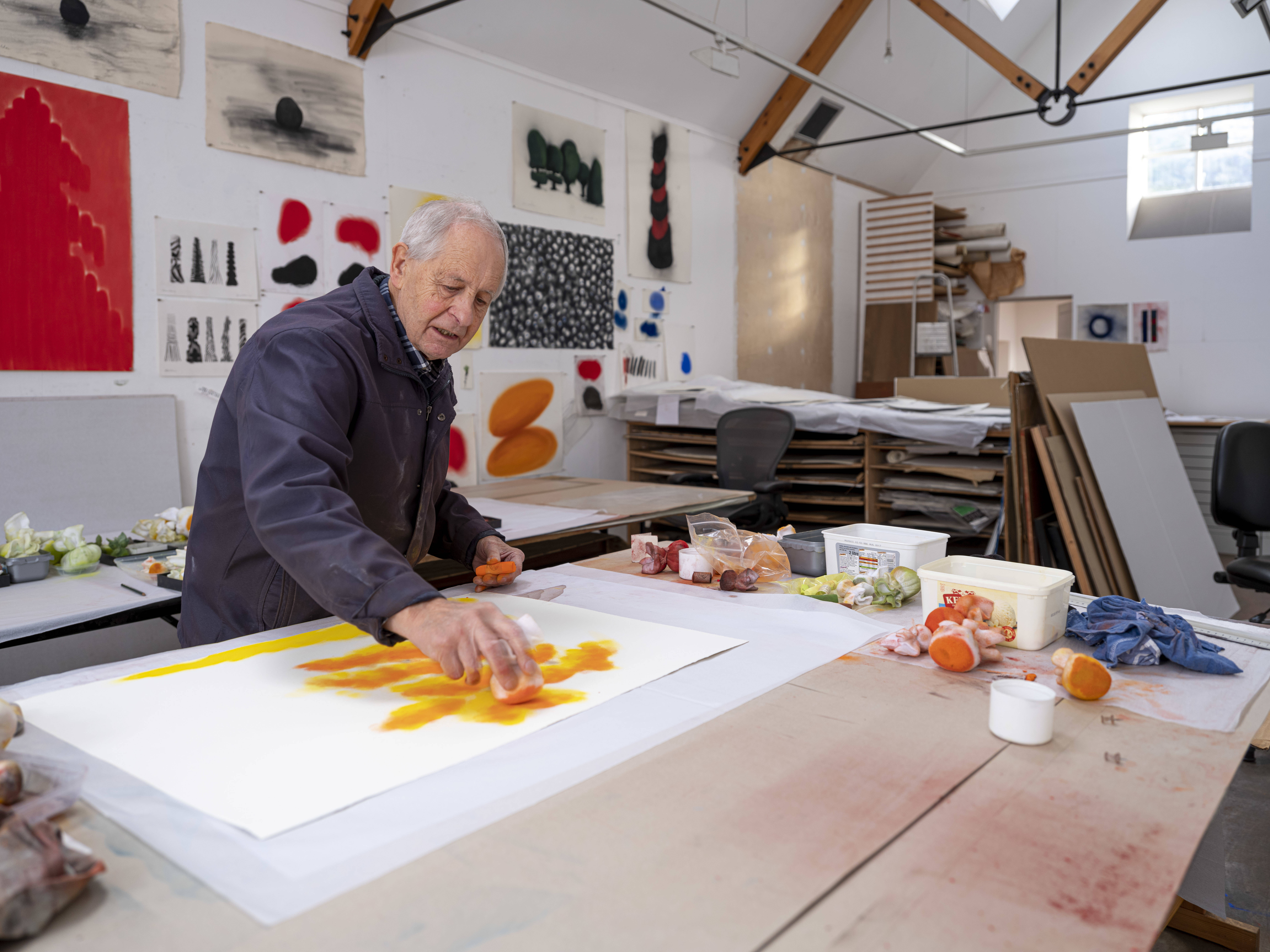 David Nash working in his studio