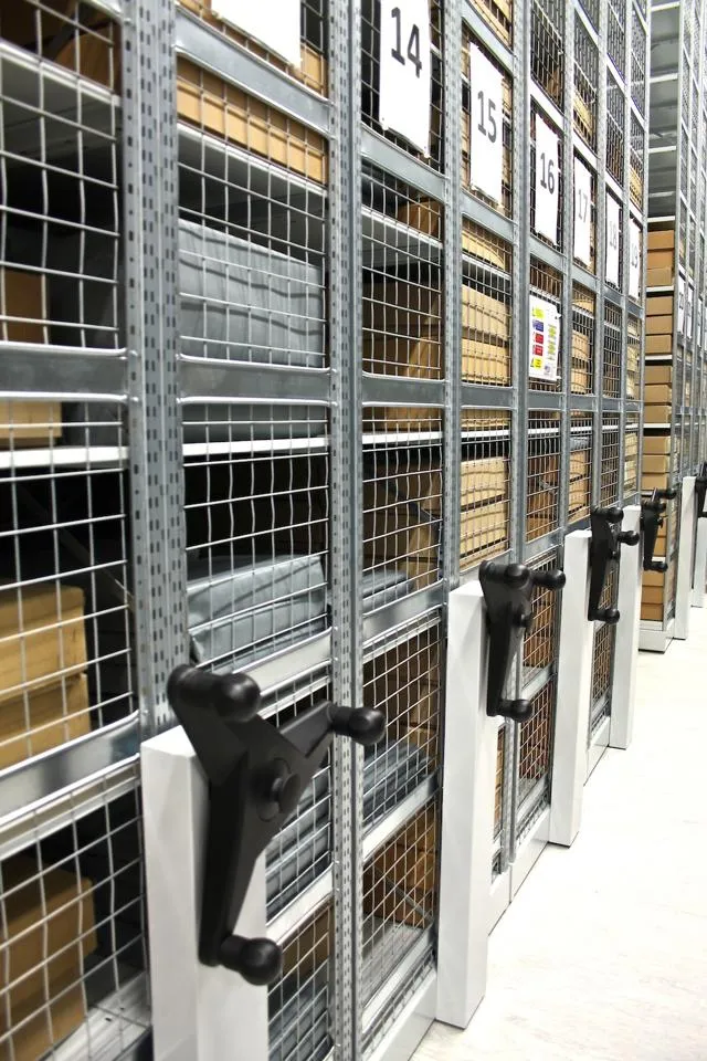 Racks of archival documents.