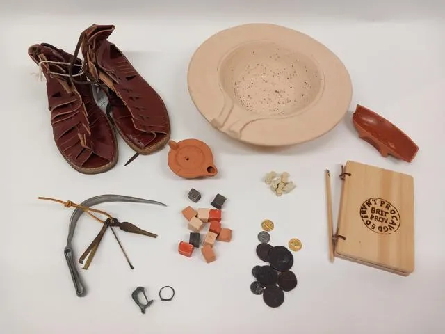 An assortment of mainly replica, Roman artefacts.