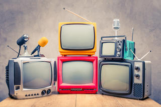 Collection of retro style microphones and televisions